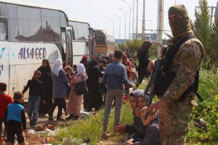 Death toll from Syria bomb attack on bus convoy rises to at least 120 people
