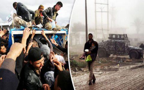 Desperate ISIS forces boys to fight and shoot families as 320,000 people flee Mosul