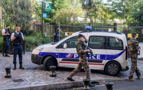 French police search home of man suspected of driving into soldiers