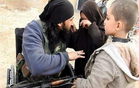 ISIS suicide bomber in a wheelchair says goodbye to his children before blowing himself up in Syria