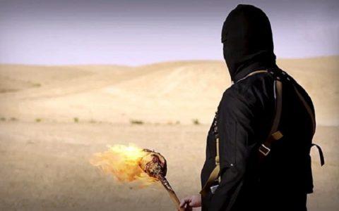 ISIS terrorists burn four men to death on charges of spying