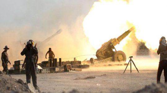 Iraqi militia shells alleged ISIS targets in Syria as the terrorists are trying to cross borders