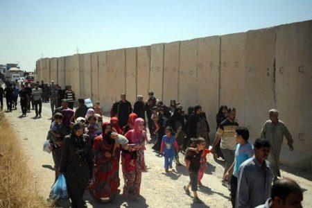 Dozens of families return to areas recaptured from ISIS terrorists in Anbar