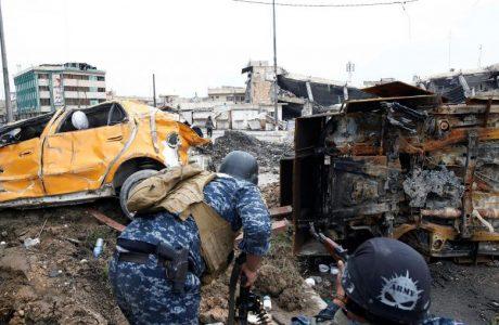 Five Iraqi officers and twelve suicide bombers killed in western Mosul in 24 hours