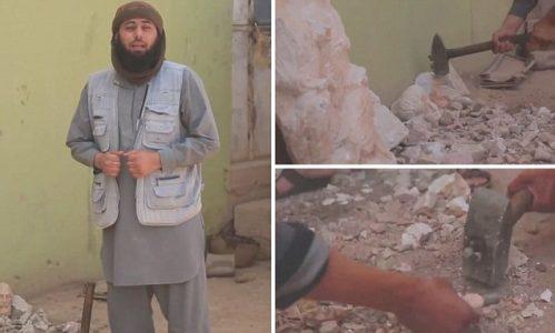 ISIS fanatic uses a hammer to destroy ancient treasures in latest attempt to wipe out Syria’s history