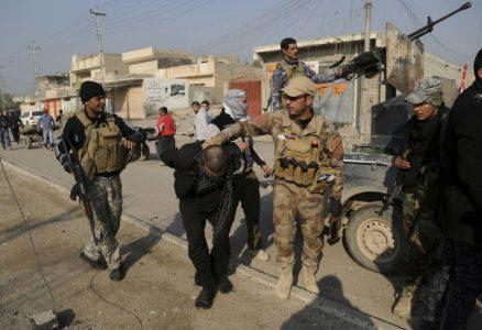 Islamic State militants surrender to security forces in Mosul
