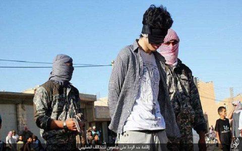 ISIS terrorists stab a man in the heart and shoot him in the head for “spying”
