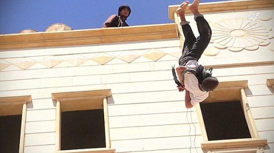 ISIS throw 15-year-old boy off a roof for being gay