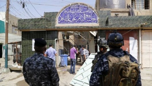 Seven people killed and 20 others are wounded in blast at mosque in Baghdad