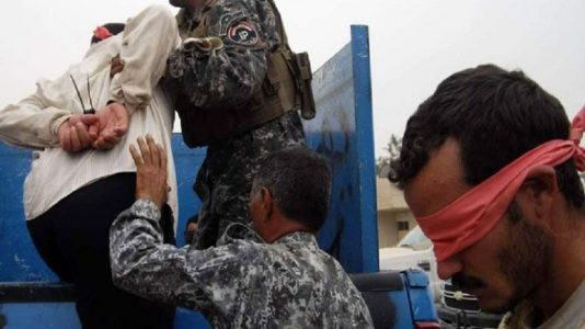 Iraqi army forces arrest former ISIS judge disguised as a woman