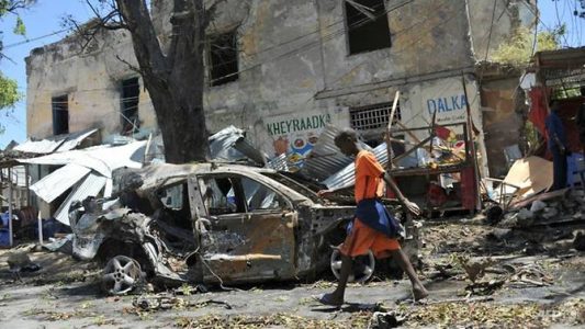 Car bombs gunfire hit government military base in southern Somalia