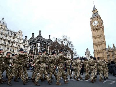 Police launch manhunt after soldier in uniform is attacked on the streets of London