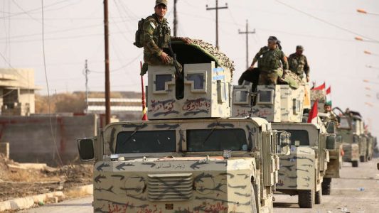 Kurdish Peshmerga forces repel a violent attack of Islamic State terrorists in a disputed area