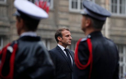 Emmanuel Macron vows fight against Islamist terror amid reports police killer was ISIS supporter