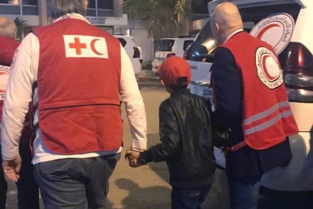 Albanian boy freed from Islamic State camp on way home to Italy