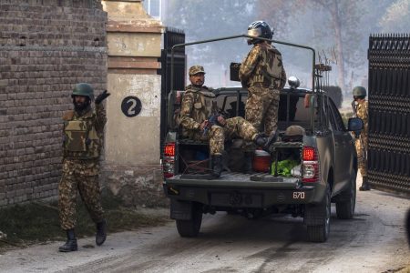 Pakistan police say that gunmen attack security vehicle as five people are killed