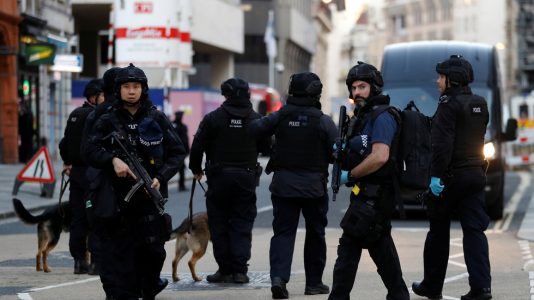 Video: Police officers shoot a man in a stabbing attack on London Bridge