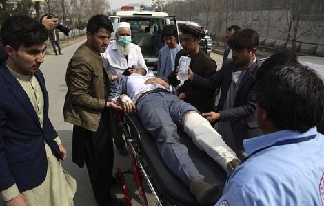 At least 27 people are killed and dozens wounded as gunmen assault political rally in Afghanistan