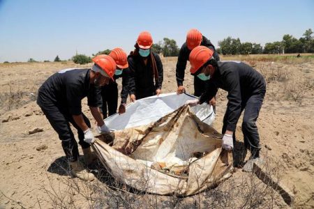 Islamic State mass grave with at least 100 bodies found in Raqqa