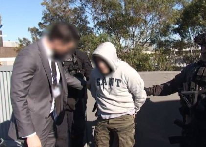Three men from Sydney arrested after military-style weapons seized in counter-terrorism raids