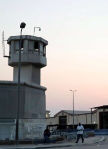 Three Egyptian policemen and four Islamist militants killed in prison break attempt