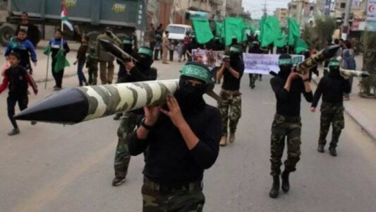 Thousands of armed Palestinian Hamas terrorists parade in Gaza for anti-Israel rally