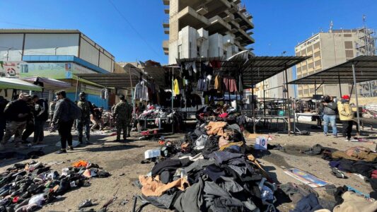 Roadside bombing at Baghdad market killed at least 25 people