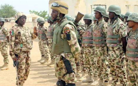 Nigerian troops battle Islamic State to regain seized military base
