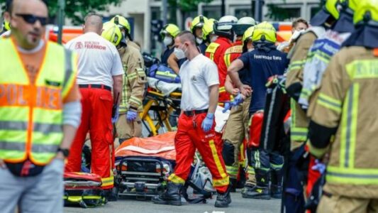 One person killed and 30 injured after car drives into crowd in Berlin shopping district