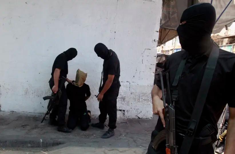 Hamas sentences three men to death