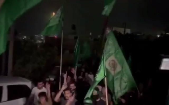 Hamas flags on display at funeral of Eli attack perpetrator