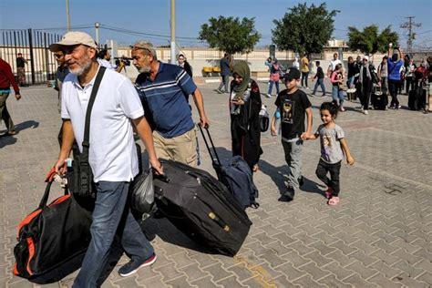 Foreign nationals and injured Palestinians allowed to flee Gaza for first time since Israel-Hamas war began