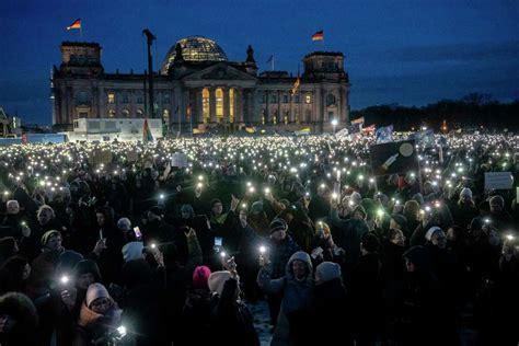 German president calls for alliance against extremism as protests against far right draw thousands